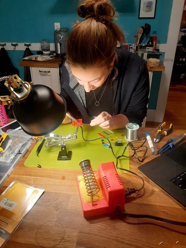  Soldering the motor driver PCB. This is a standard L298 and includes diodes which prevent back EMF from reaching the Arduino and other delicate components. 