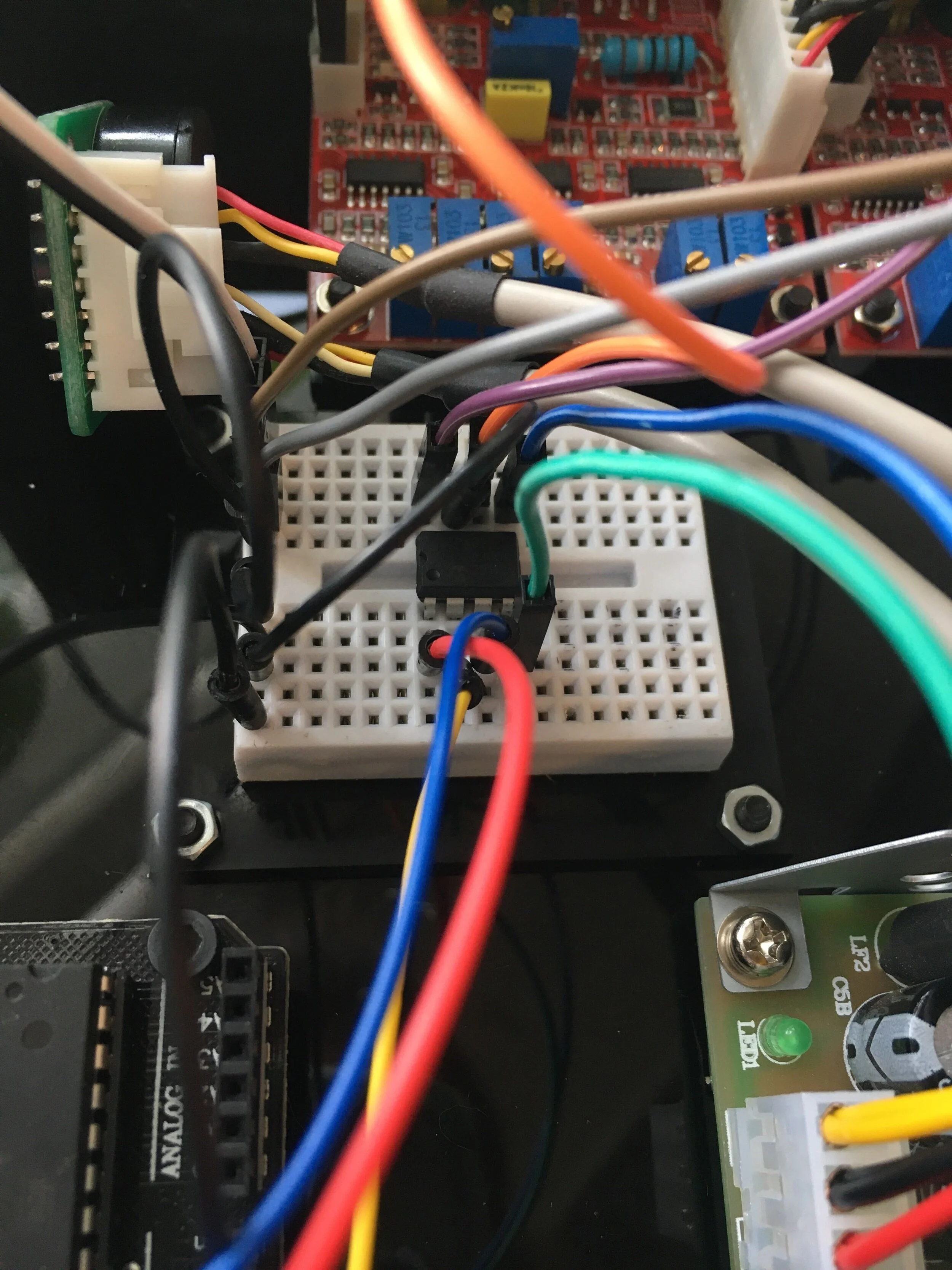  Close up shot of the breadboard - featuring the MCP4822 digital to analog converter microchip which output signals to the galvo drivers from the Arduino. 