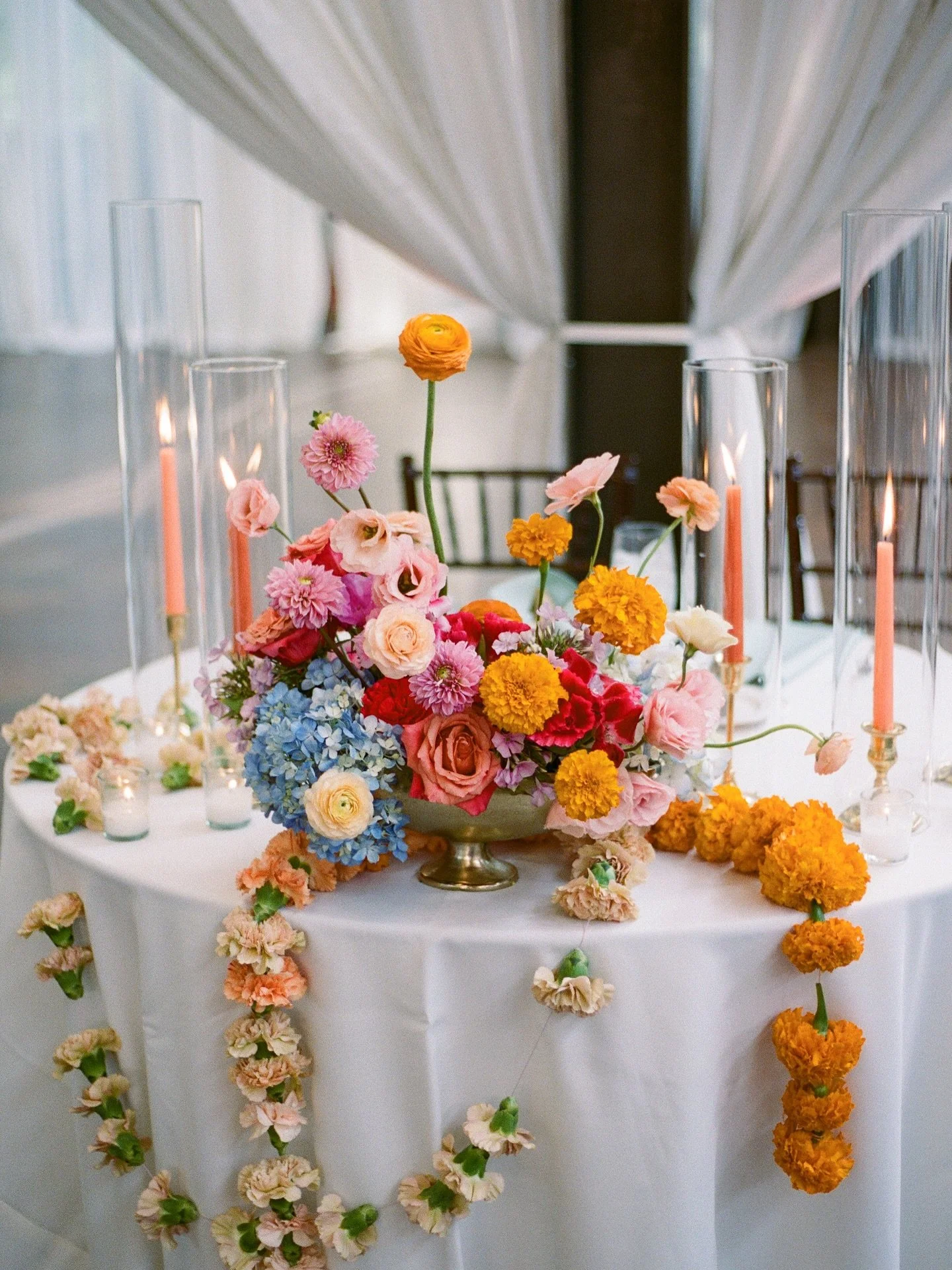 From the gorgeous light beaming through the skylights to the glittering disco balls above the dance floor, and the vibrant florals, every detail helped create the perfect backdrop for Hemrani and McLane&rsquo;s unforgettable celebration!🧡

Check out