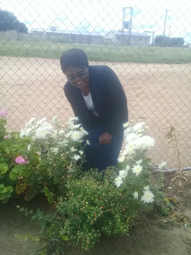 Pic of Theresa in her garden in Drimiopsis, Namibia