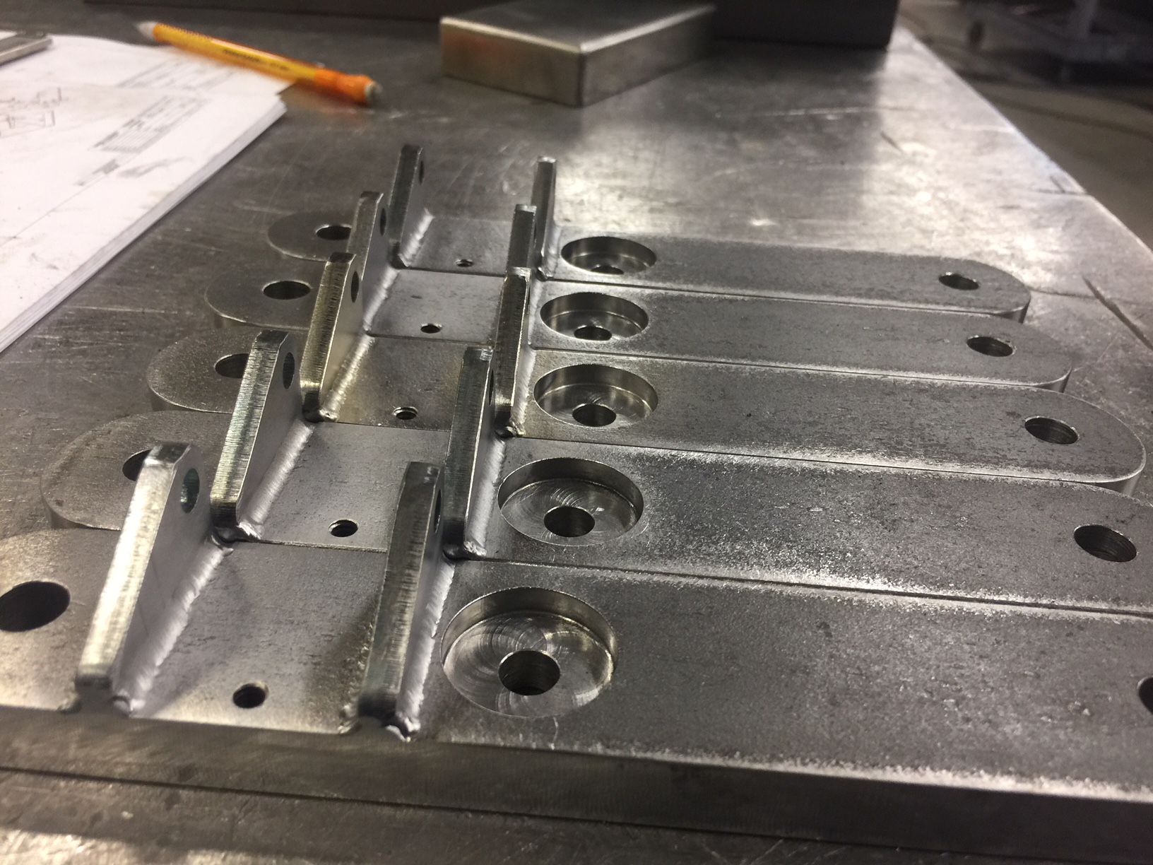 Several tracking arms in progress.