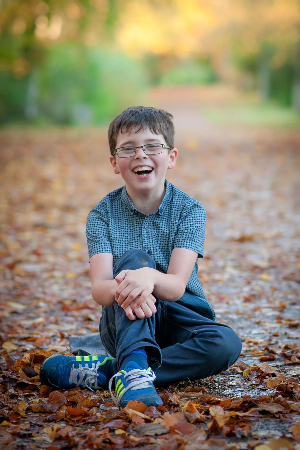 little boy giggling in Angus park.jpg