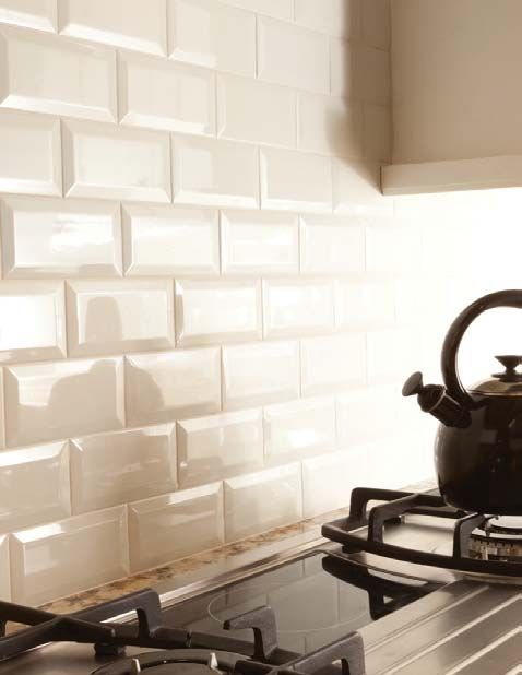 if you're set on using a subway tile, consider one with a beveled edge; it'll provide more dimension and light play than a flat subway would, giving the appearance of a much more high-end and thoughtful design, without the high-end price tag.