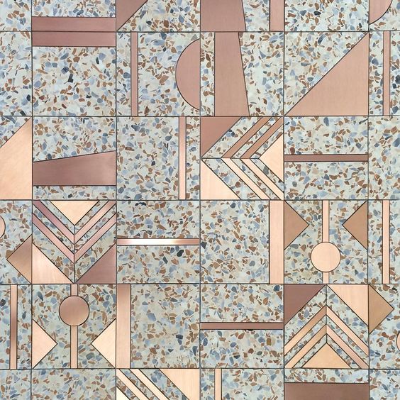 when originally created in the 1920's, terrazzo was poured in huge formats and was extremely prone to cracking; the solution to this was the metal dividers you often see inlaid in floors; smaller sections were able to be poured and make the material less prone to cracking. with modern terrazzo materials, cracking is much less of an issue, but thank god for the metal dividers, because for it we have designs like these.