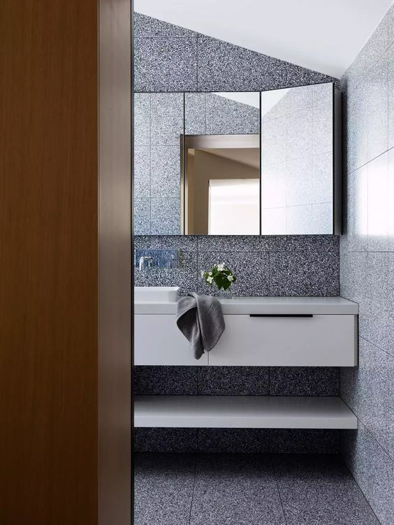 again, large format! a characteristic of terrazzo is the relative even distribution of the aggregate between tile to tile, so tiling rooms such as this appear as seamless as possible.