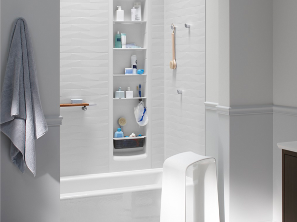 the kohler choreograph system consists of large groutless wall panels with customizable accessories