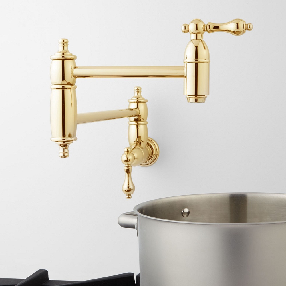 waterworks traditional oscillating pot filler in unlacquered brass - the ultimate guide to luxury plumbing by the delight of design
