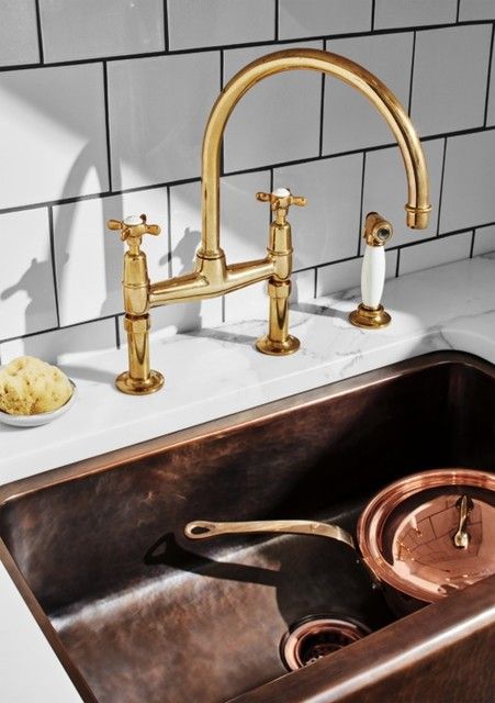 waterworks bridge cross handles with sidespray faucet in unlacquered brass and white porcelain - the ultimate guide to luxury plumbing by the delight of design