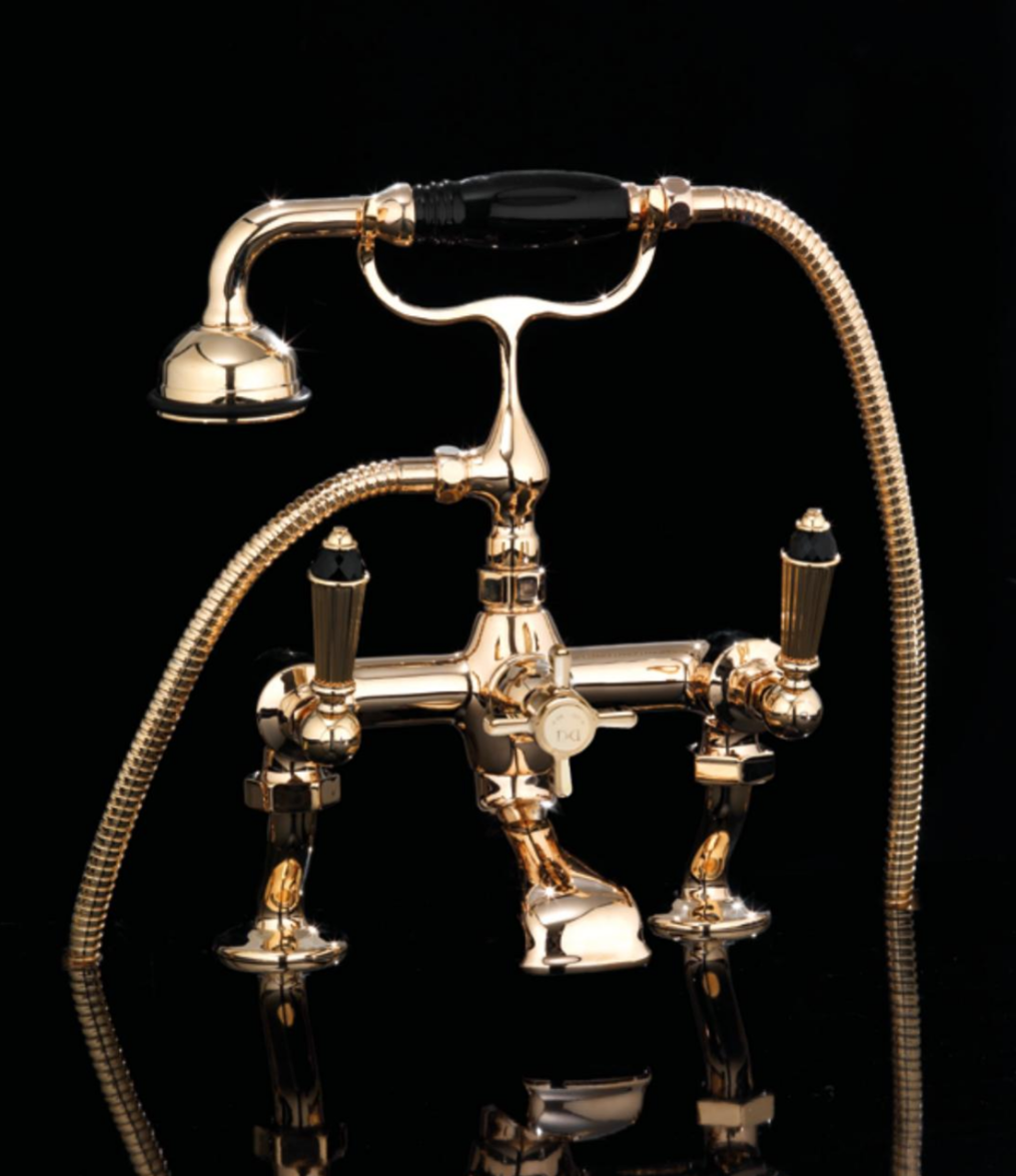 devon & devon traditional tub filler in polished gold with black trim and cross handle - the ultimate guide to luxury plumbing by the delight of design