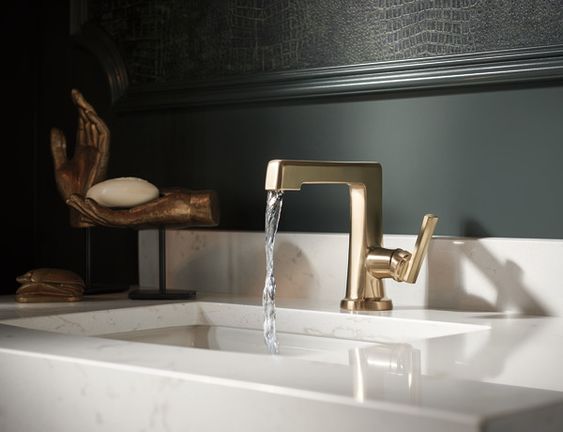 brizo single hole side control lav faucet in luxe gold - the ultimate guide to luxury plumbing by the delight of design