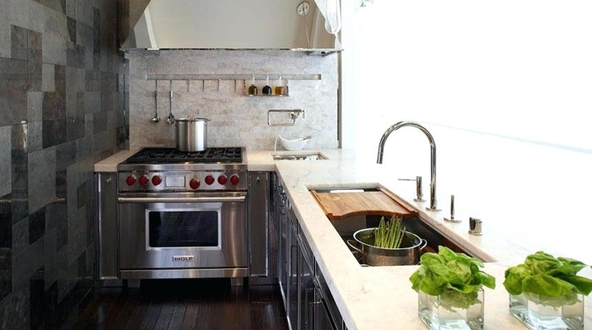 kallista one pulldown kitchen faucet with remote valve and pot filler in polished chrome and solitiere sink by mick de guilio - the ultimate guide to luxury plumbing by the delight of design