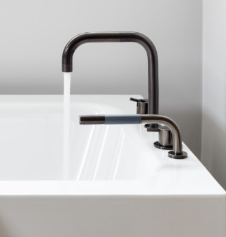 vola contemporary minimalist deck mount bath filler with handshower in black with lever handles and 90 degree spout - the ultimate guide to luxury plumbing by the delight of design