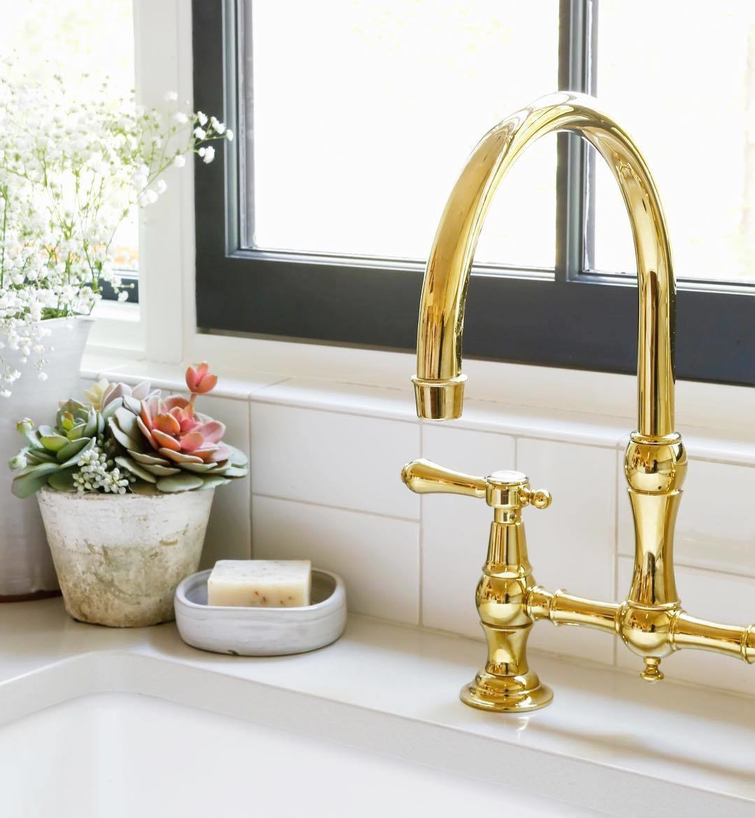 newport brass traditional two hole bride kitchen faucet with lever handles and gooseneck spout in polished gold - the ultimate guide to luxury plumbing by the delight of design