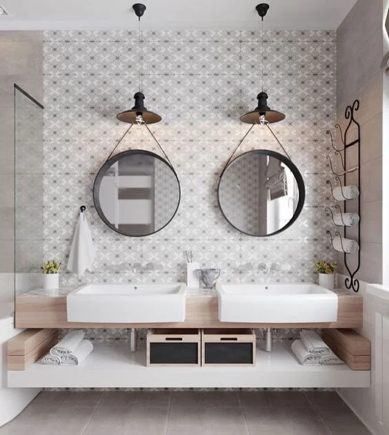 two contemporary apron front sinks in the bathroom built into the vanity
