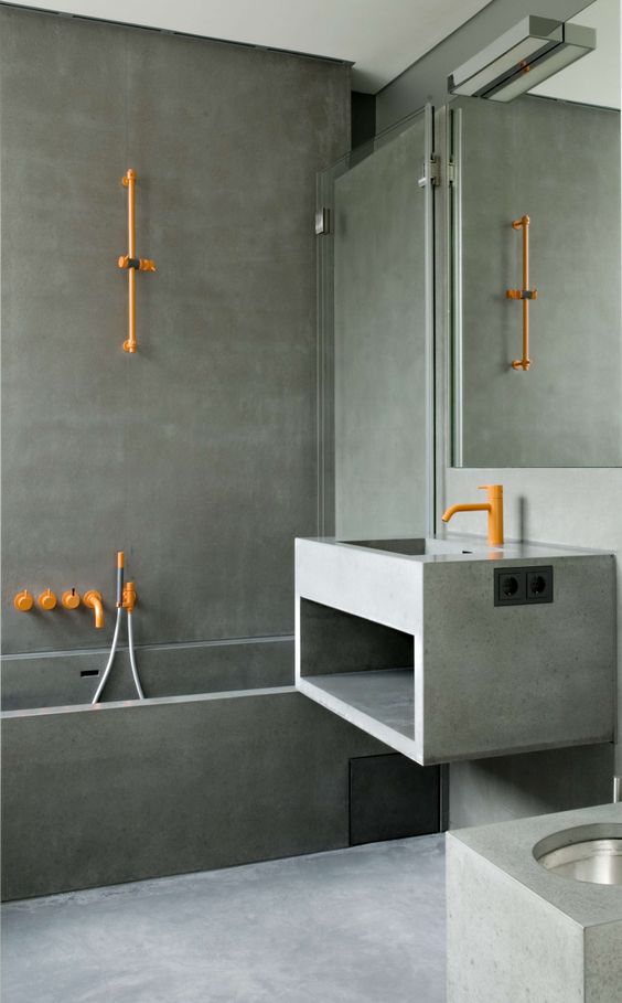 orange colored shower trim and tub filler