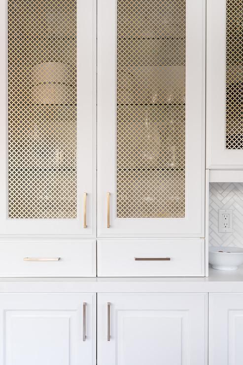 light cabinet with brass wire mesh panel insert
