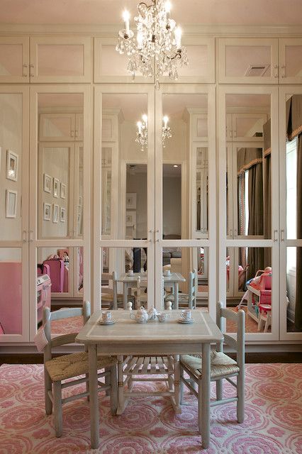 taupe cabinets with mirror and mullion inserts