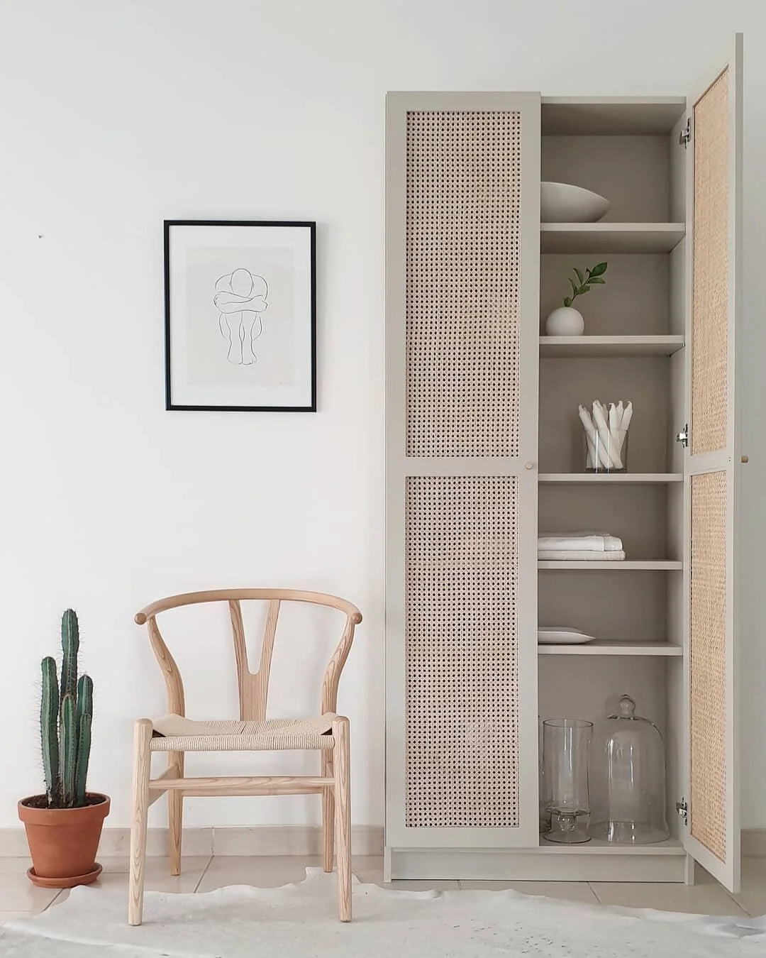 cabinet and wishbone chair by @houseofhawkes