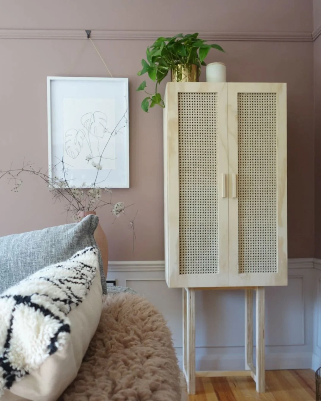 cane cabinet blush wall by @greenandmustardathom