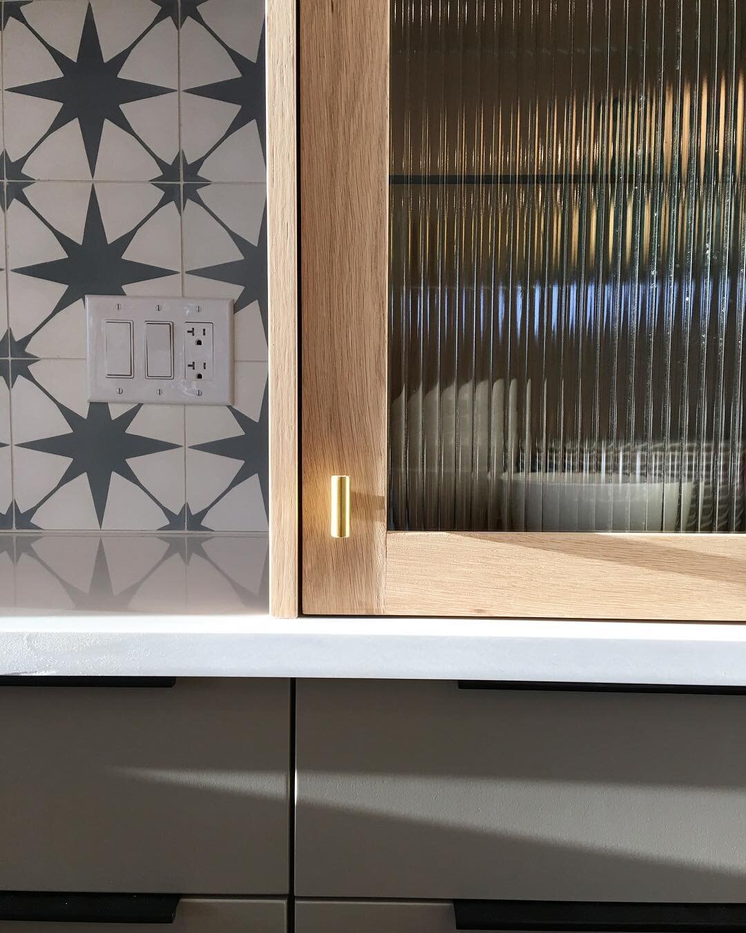 reeded glass cabinet insert oak frame unlacquered brass hardware