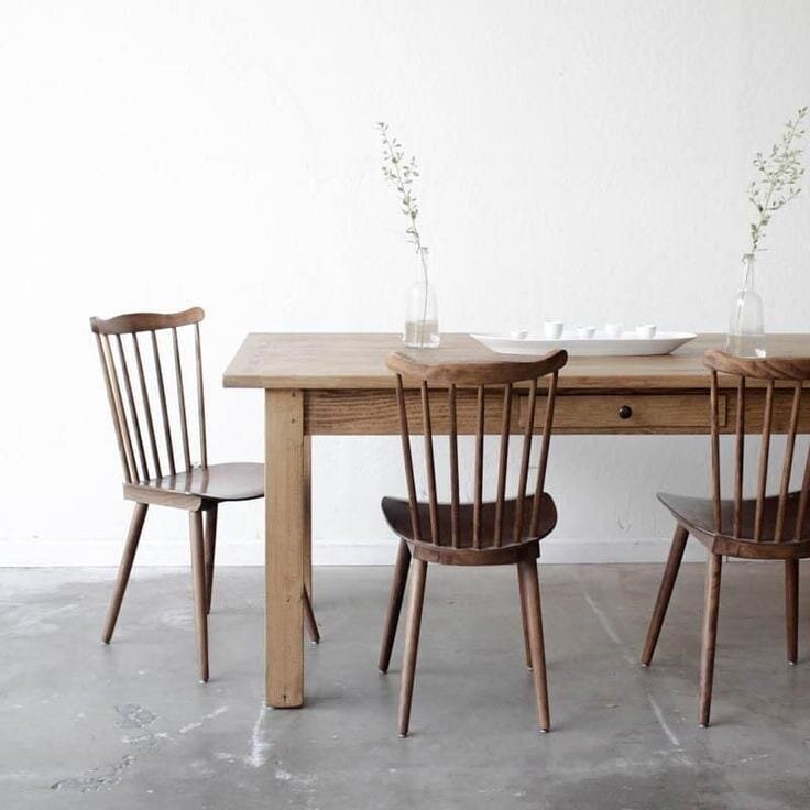 concrete floor rugged earthy wood chairs natural shaker dining table
