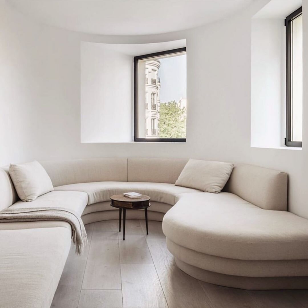 modern sofa organic form neutral tonal curving