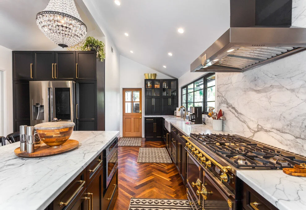 black stove brass hardware black cabinets