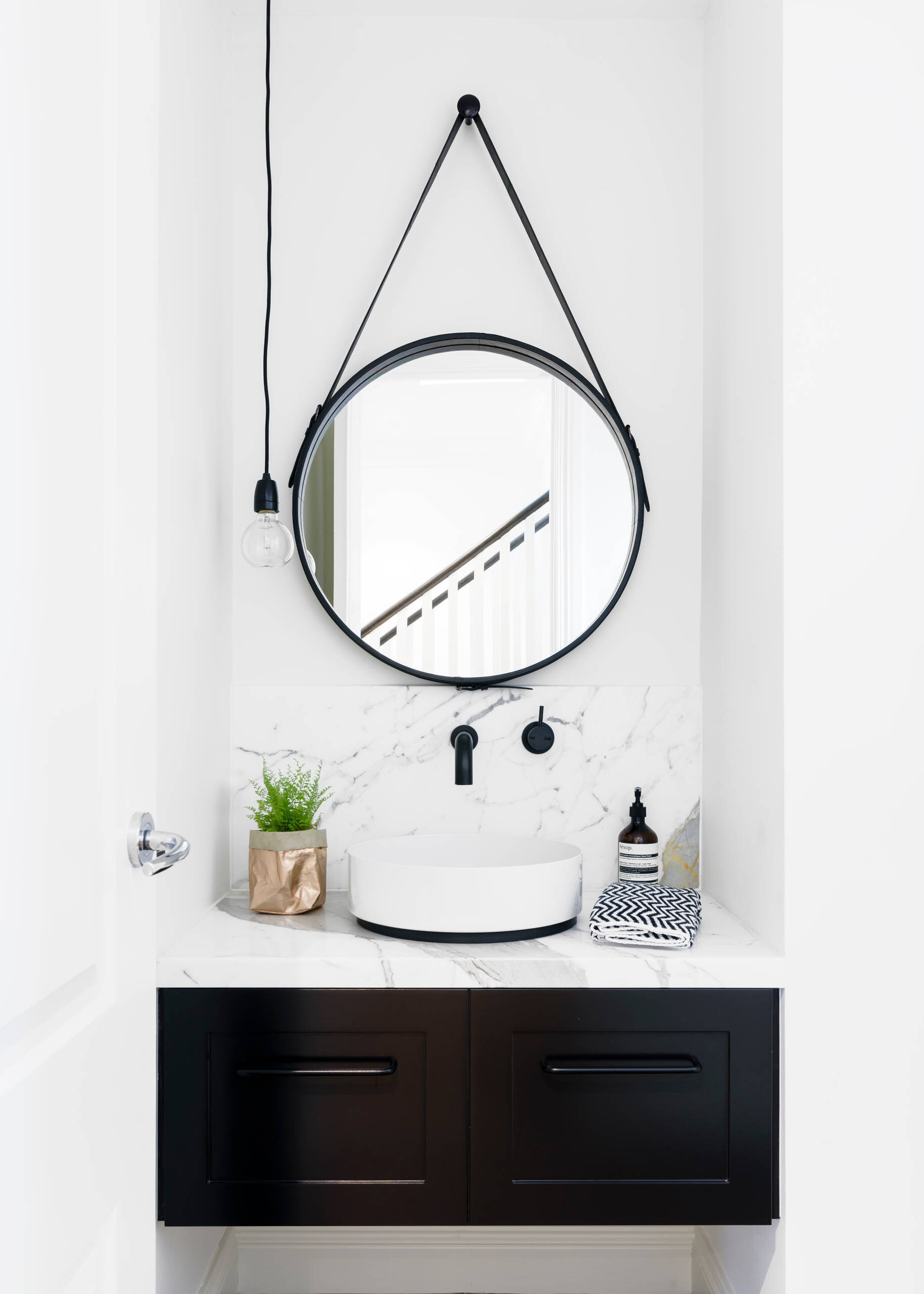 tiny powder room matte black wall mounted faucet vessel sink black floating vanity marble top