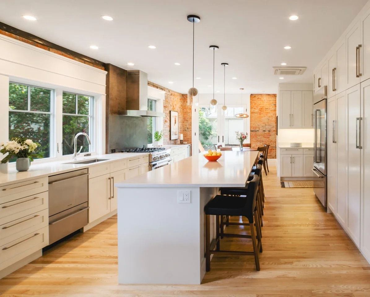 Light maple hardwood floor installation in a modern Boulder, Colorado kitchen