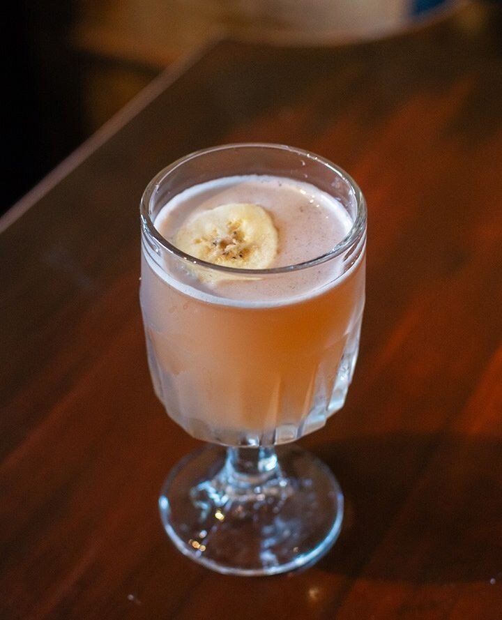 Nothing says spring like a fruity cocktail with a banana slice garnish! The Hotel Motel is sure to be a favorite of our Spring menu. Come by Scofflaw for a drink&hellip;or two!⁠
📷: @outofthedark_photography⁠
⁠
#scofflaw #scofflawchicago #logansquare