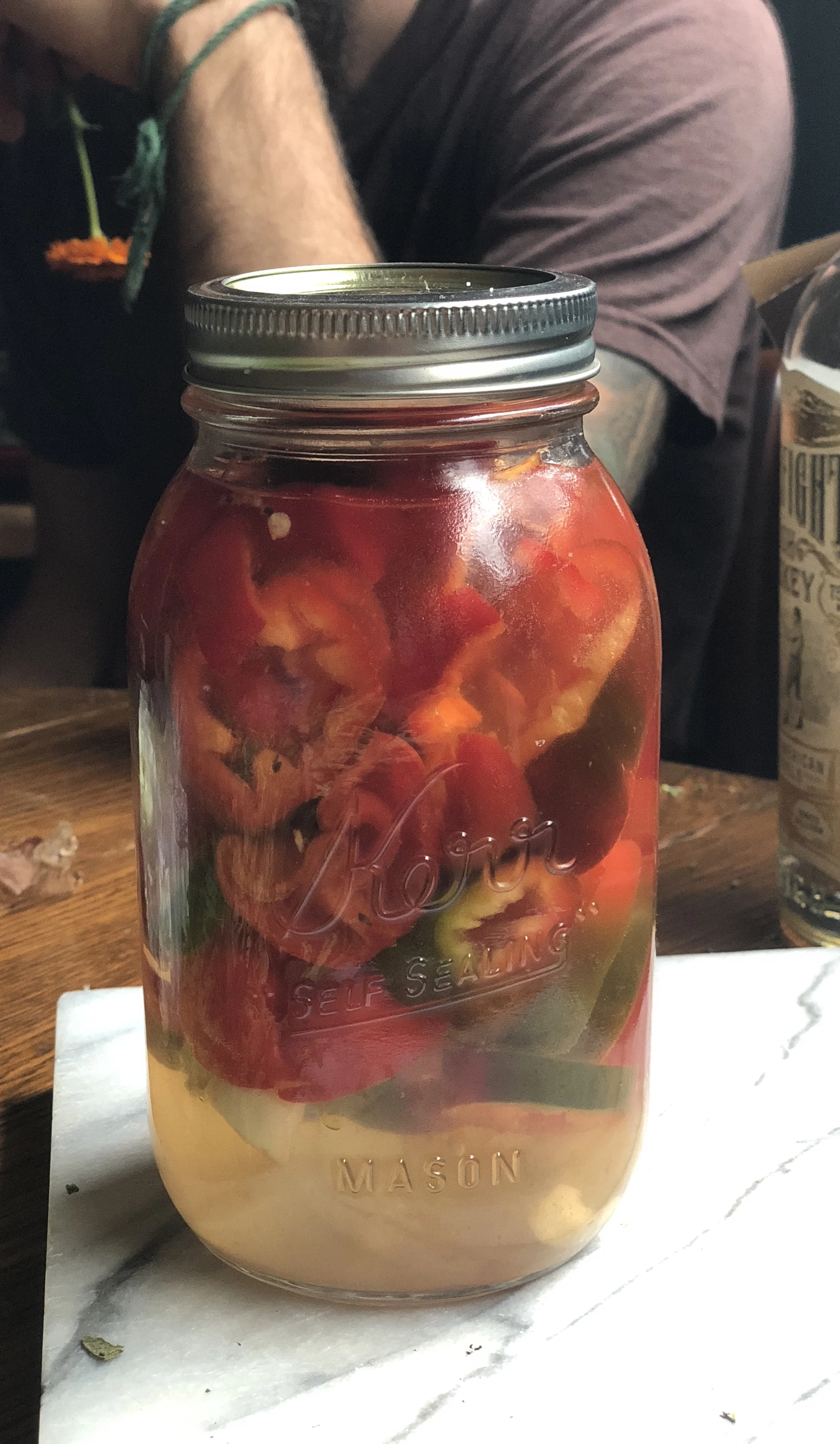 Peppers in lacto-fermenting process