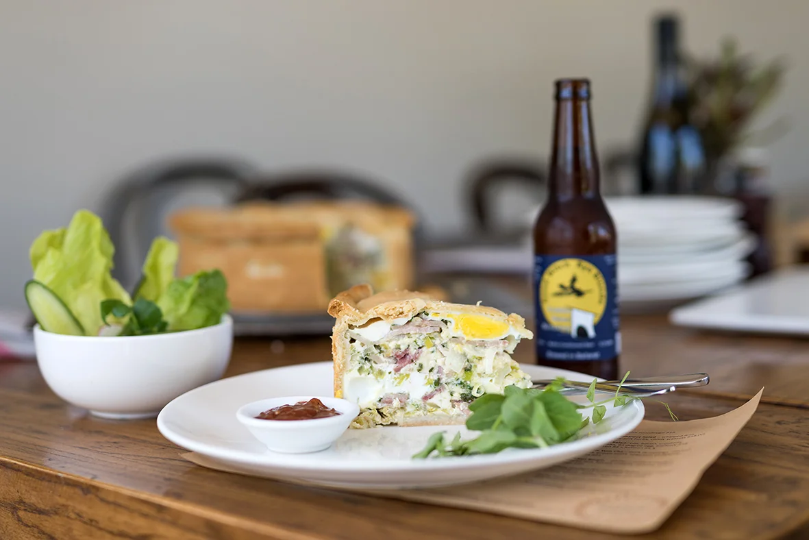 ECLECTIC TASTES - EGG & BACON PIE A classic egg and bacon pie made with a simple shortcrust pastry filled with Country Style Smallgood’s Bacon, Inglenook cream, Elm Grove Farm free range eggs and fresh herbs. Served with tomato relish and a choice of either a side of chips or crisp garden salad. BEER MATCH: Cubby Haus Brewing Good Witch Rye Blonde Price: $12.50 or $20 with beer Gluten Free: No Where: Eclectic Tastes, 2 Burnbank St, Lake Wendouree