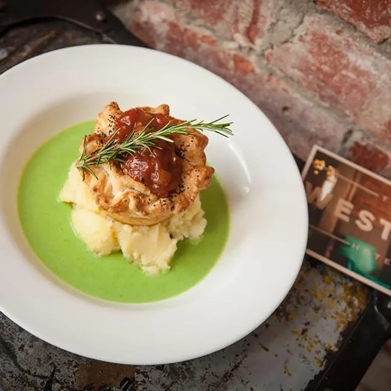 THE WESTERN HOTEL - LAMB & ROSEMARY PIE Slow cooked Waubra lamb on a bed of creamy mashed local potatoes with mushy peas. BEER MATCH: Cubby Haus Brewing Extra Special Bitter Price: $19 or $26 with beer Gluten Free: Gluten free pie available subject to availability, matched with O'Brien Pale Ale Where: The Western, 1221 Sturt St, Ballarat