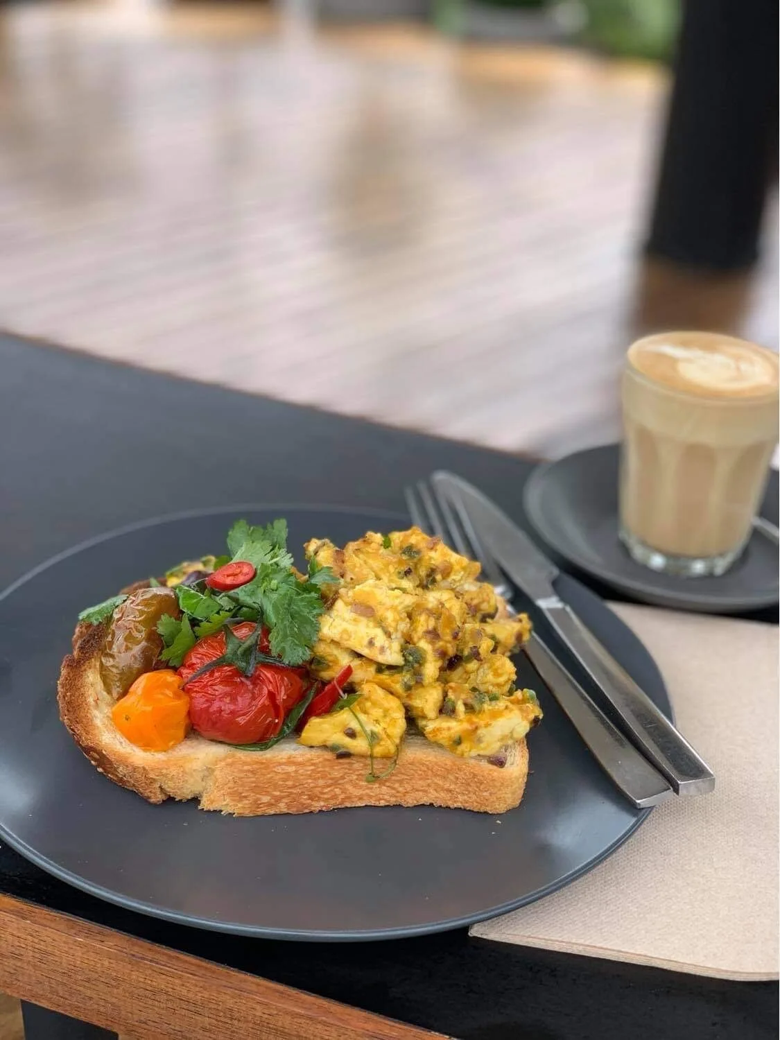 DRIVE CAFE - TOFU SCRAMBLETofu scramble served on sourdough with roasted tomatoes and Asian herbsVEGAN OR VEG: Vegan GF: Yes AVAILABLE: Thursday to Sunday Breakfast & Lunch (Dine-In & Takeaway)  Where: 227 Grant Street To order: Call 4373 16…