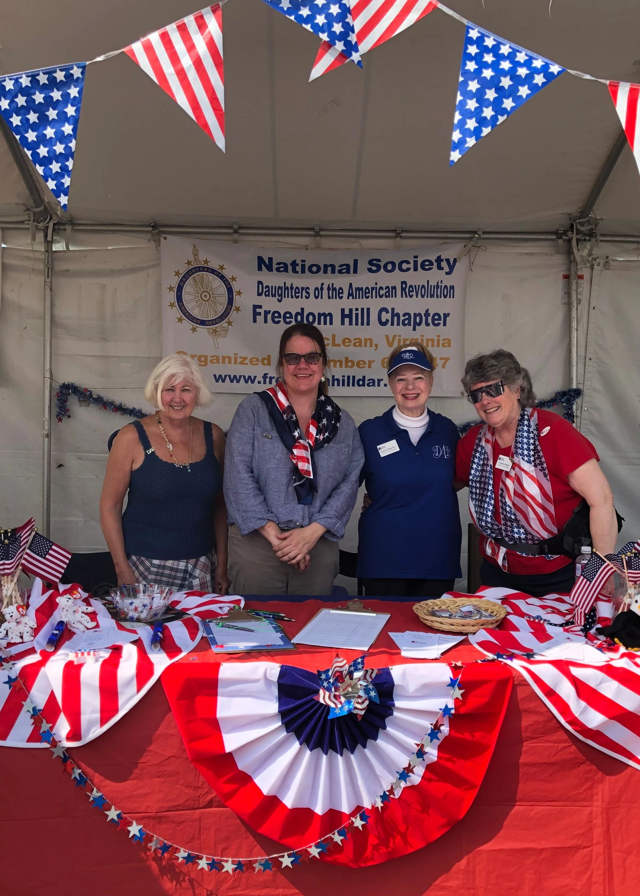 Freedom Hill Daughters promote our chapter and DAR at the annual McLean Day celebration.