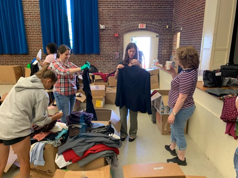 Freedom Hill Daughters sort clothing for Final Salute’s Next Uniform event for female veterans transitioning to civilian life. August 2019