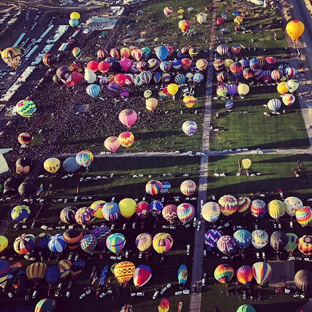 Those crowds tho. A million people will pass through the gates at #balloonfiesta and many more will see coverage on national and international tv, internet and social media outlets. Contact us to be a part of it next year. #hotairrize #experientialma