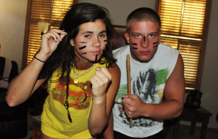 Sadly these weren't costumes, we had just gotten back from the beach and decided to play guitar hero, but of course needed war paint to be a serious band. Beach kids at heart. 