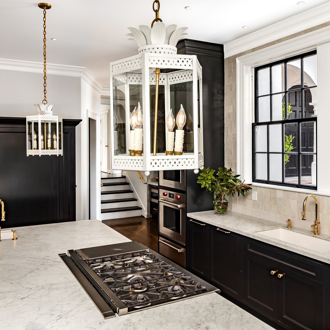Today Noelle is featuring the exquisite #lighting fixtures from our current listing #forsale at 395 Hampton Road in #Piedmont. 
To hang over the marble-clad island and elsewhere in the kitchen, three lanterns and a pair of chandeliers with brass and 