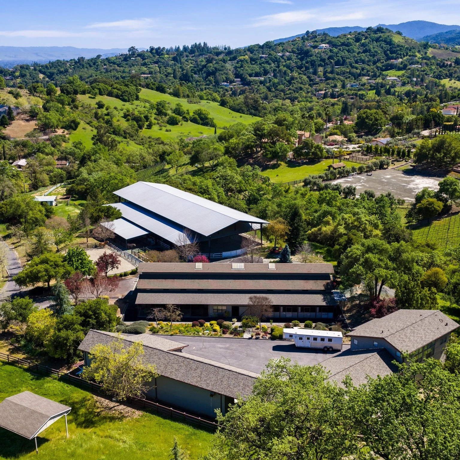 In the rolling foothills of Saratoga is our newest listing at 22480 Mt Eden Road. This estate offers luxury living combined with a world-class equestrian center including:
✅ 20,000 sq. ft. Covered Riding Arena
✅ 16-Stall Professional Barn
✅ Direct Tr
