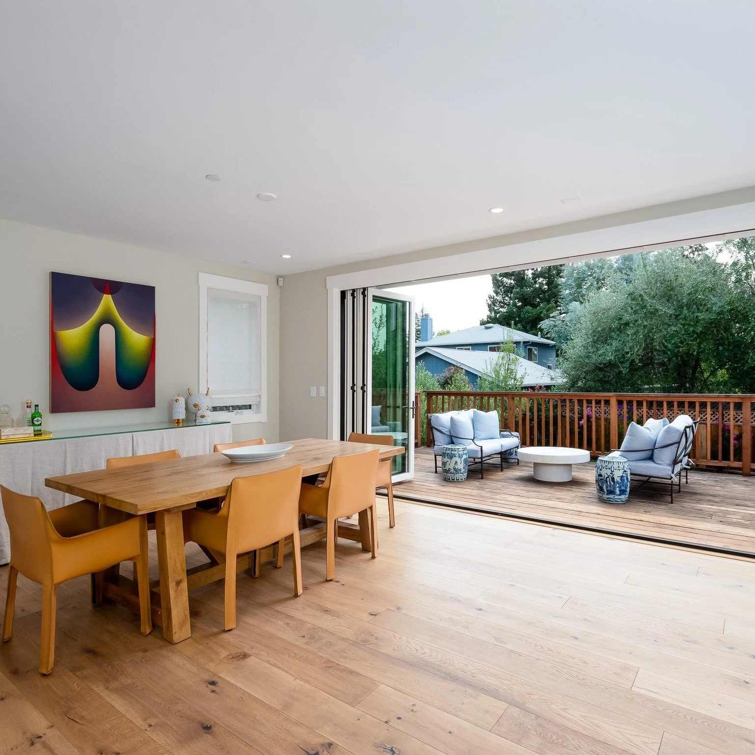 This Menlo Park dining room is transformed into an effortless indoor/outdoor oasis by a set of folding glass walls that provide wide, unobstructed openings. Ready to find your dream space? We offer trusted local insights, access to off-market listing