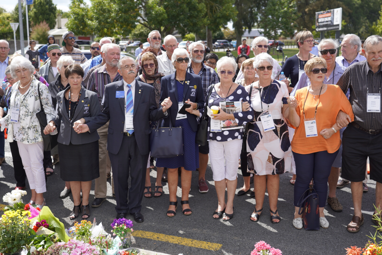 Rotary members join hands with mosque members from the Boundary Road Mosque, Hamilton.