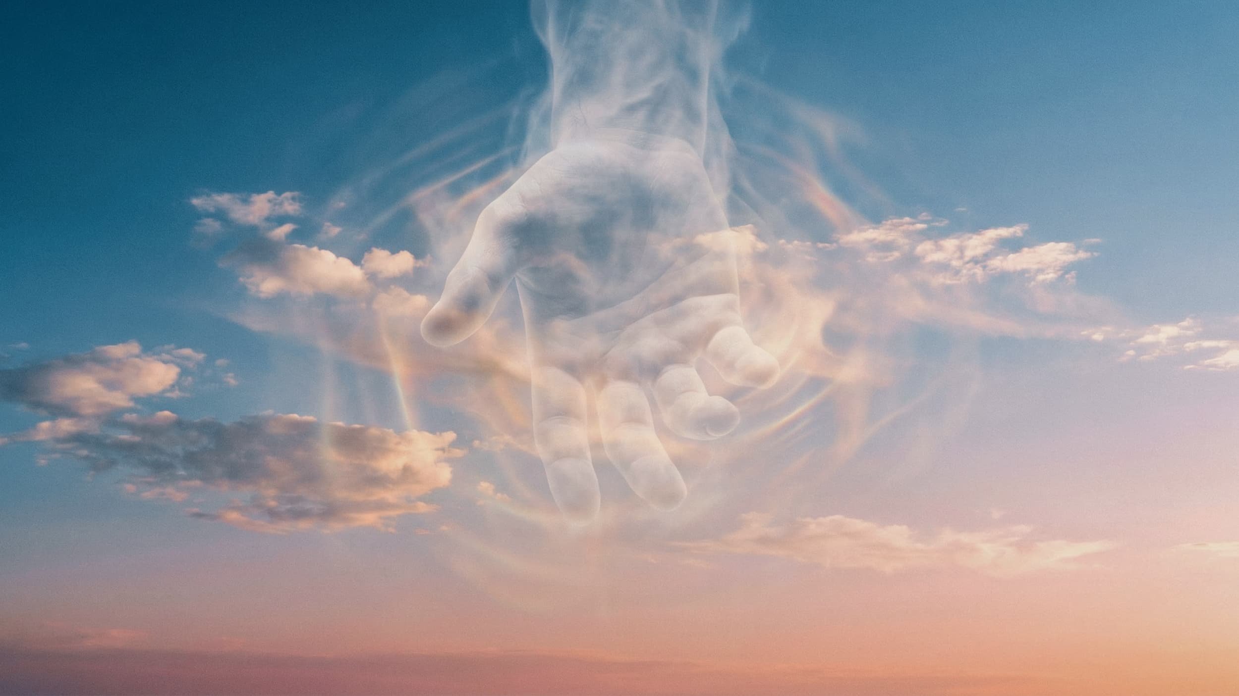 A translucent hand made of clouds extends from the sky, surrounded by soft clouds at sunset.