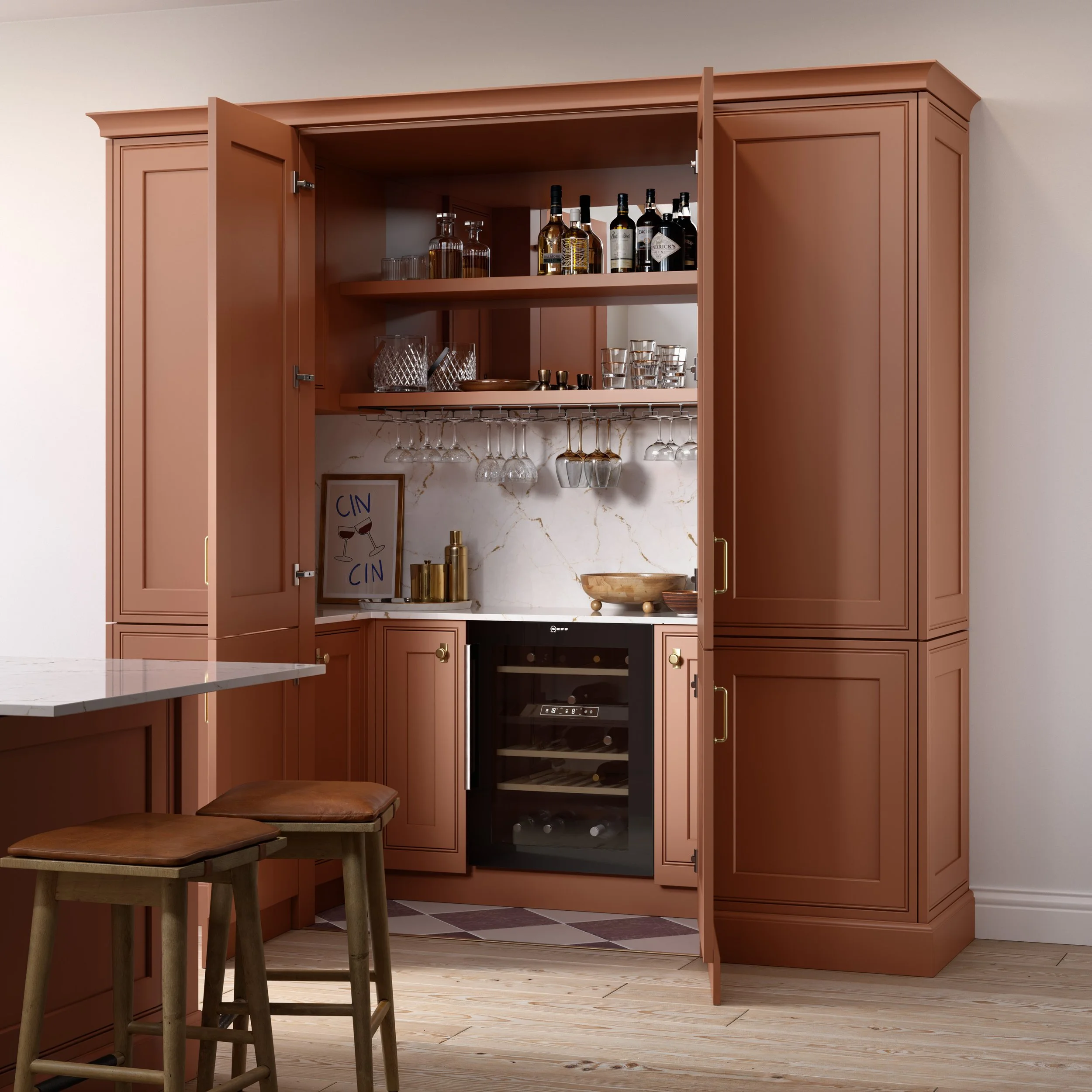 A traditional in frame pantry cabinet painted in a pale rose light red colour with open doors, showing internal bar area with shelving, built in winecooler and dressed with various glass accessories. 