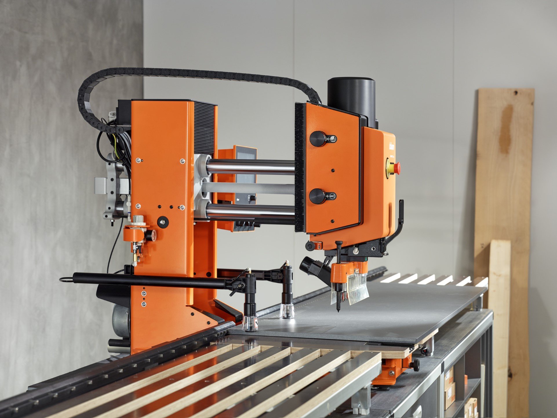 Blum machinery used for precision drilling and hinge installation in kitchen cabinet production