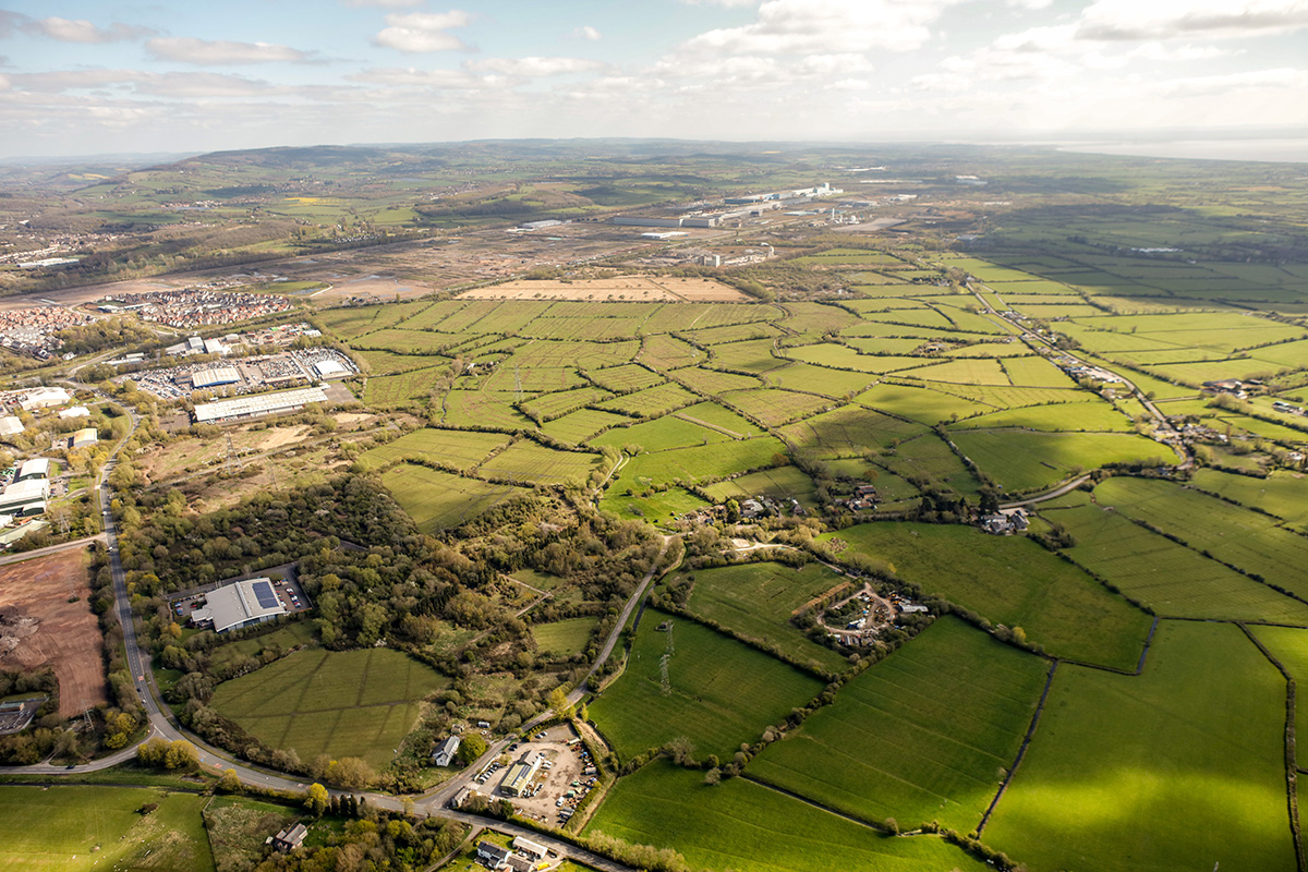 Looking east over Pye Corner towards Llanwern Steel Works.