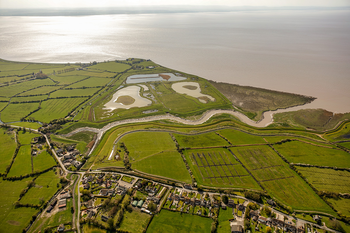 Looking south-east over Goldcliff village, Goldcliff Pill, and the lagoons.