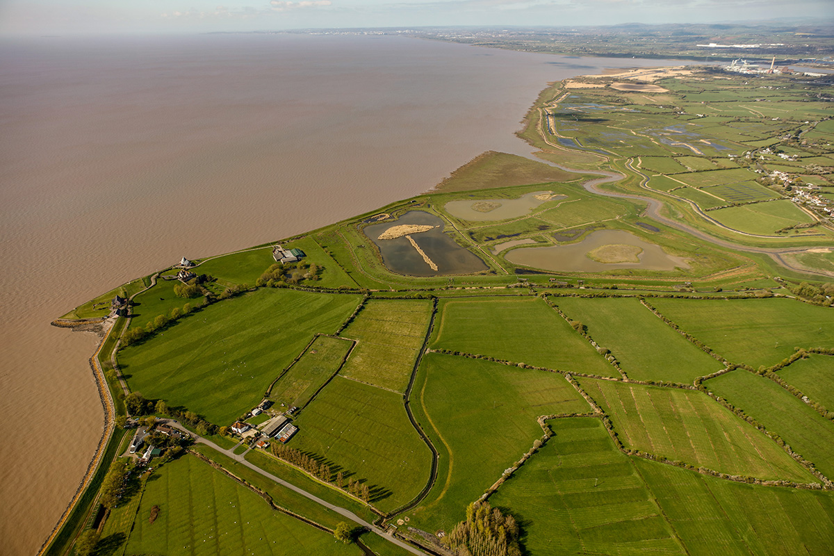 Looking west over Goldcliff towards Goldcliff Lagoons and Newport Wetlands (top right).