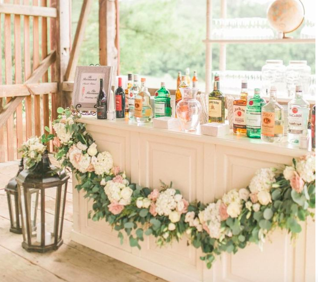 flowers on bar, wedding bar ideas, outdoor wedding, ARJ productions