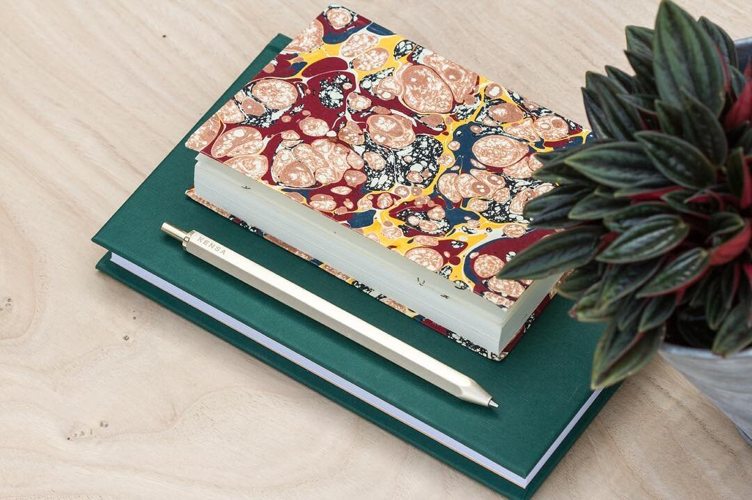 Only one week into our Kickstarter and thanks to all our backers we're almost funded. Which leads us to stretch goals, maybe note books? This one's locally hand bound with traditional hand marbled paper.
